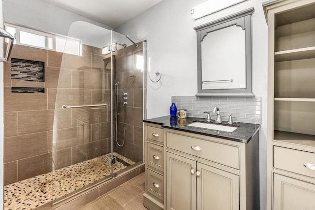 1670 Alta Vista Dr, Vista, CA 92084 - full bathroom with a stall shower, vanity, and backsplash