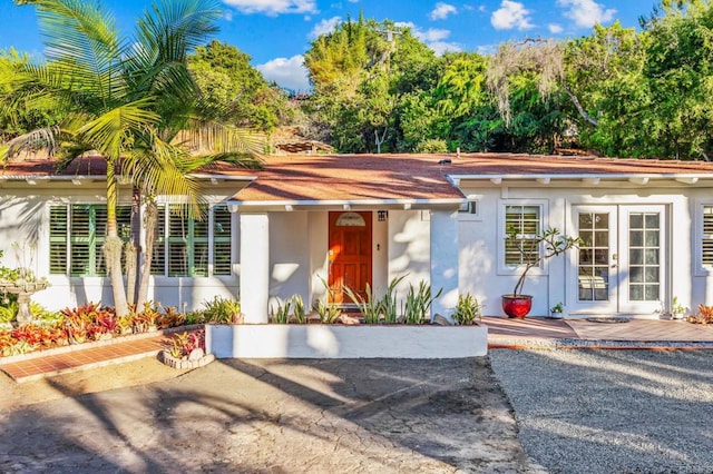 1670 Alta Vista Dr, Vista, CA 92084 - view of front of house with french doors and stucco siding