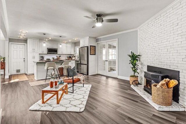 1670 Alta Vista Dr, Vista, CA 92084 - living area featuring crown molding, ceiling fan, and dark wood-type flooring