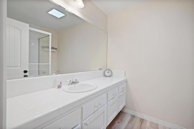 8566 Van Ness Ct Unit 19G, Huntington Beach, CA 92646 - bathroom with vanity and wood finished floors