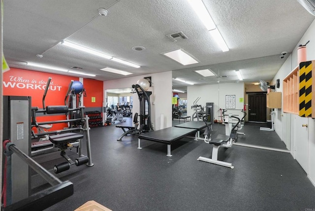 8566 Van Ness Ct Unit 19G, Huntington Beach, CA 92646 - workout area featuring a textured ceiling