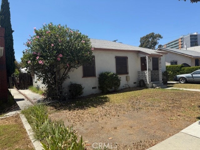14319 Devlin Ave, Norwalk, CA 90650 - view of front of house with crawl space and stucco siding