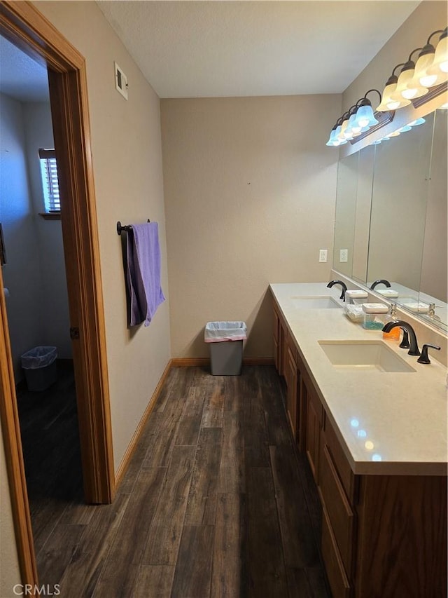 41653 62nd St W, Palmdale, CA 93551 - bathroom with wood finished floors and double vanity