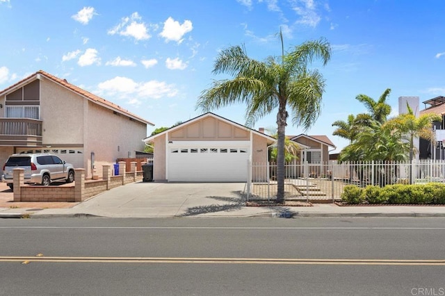 7549 Goode St, San Diego, CA 92139 - view of front of home featuring a garage and concrete driveway
