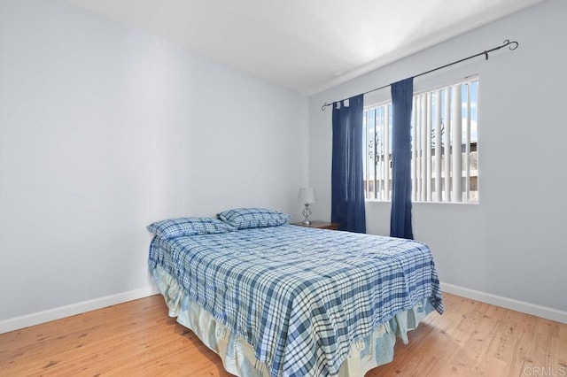 7549 Goode St, San Diego, CA 92139 - bedroom with baseboards and wood finished floors