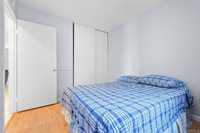 7549 Goode St, San Diego, CA 92139 - bedroom with light wood-style floors and a closet
