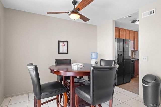 7549 Goode St, San Diego, CA 92139 - dining area featuring a ceiling fan and light tile patterned floors