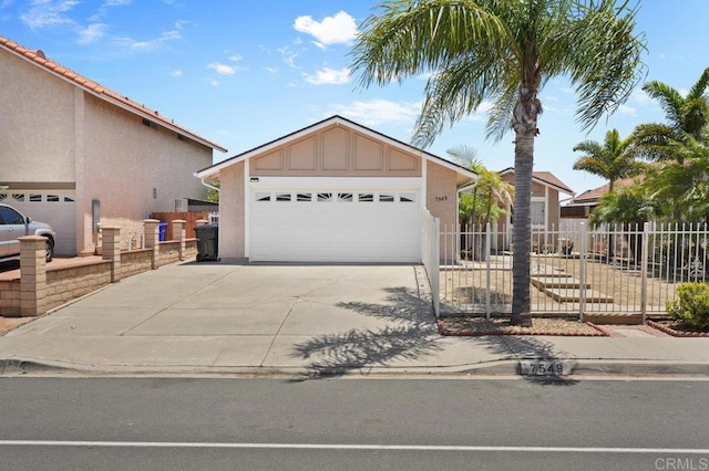 7549 Goode St, San Diego, CA 92139 - ranch-style home with a garage, stucco siding, board and batten siding, and concrete driveway