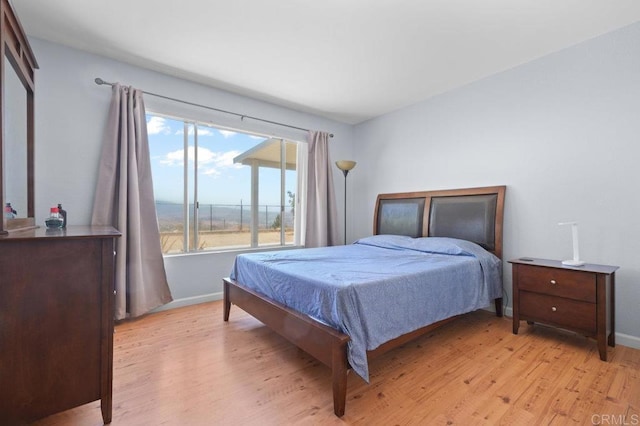 7549 Goode St, San Diego, CA 92139 - bedroom featuring light wood finished floors and baseboards