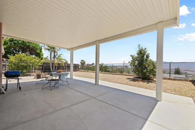 7549 Goode St, San Diego, CA 92139 - fenced backyard with a grill, a patio, and outdoor dining space