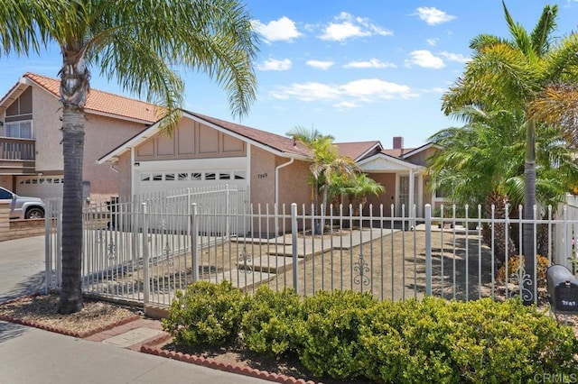 7549 Goode St, San Diego, CA 92139 - ranch-style home with stucco siding, an attached garage, a fenced front yard, and board and batten siding