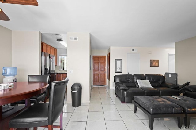 7549 Goode St, San Diego, CA 92139 - living area with light tile patterned floors and a ceiling fan
