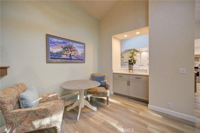 6362 Coffeeberry Ct, Avila Beach, CA 93424 - living area with light wood-style floors and vaulted ceiling