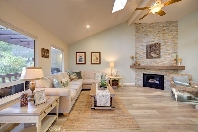 6362 Coffeeberry Ct, Avila Beach, CA 93424 - living room featuring wood finished floors, ceiling fan, beamed ceiling, a fireplace, and high vaulted ceiling