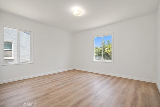 5609 Clark Ave, Lakewood, CA 90712 - empty room featuring light wood-type flooring and baseboards