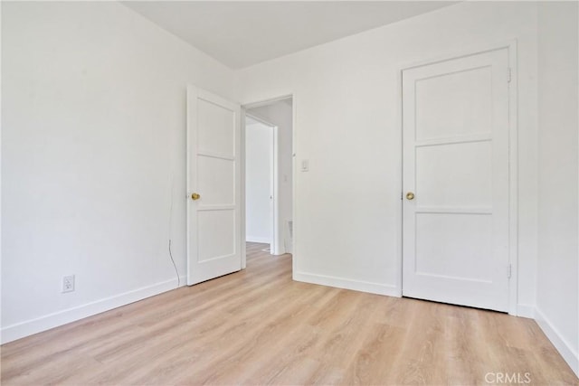 5609 Clark Ave, Lakewood, CA 90712 - unfurnished bedroom featuring light wood-style floors