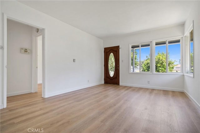 5609 Clark Ave, Lakewood, CA 90712 - foyer featuring light wood-style floors and baseboards