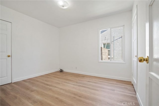 5609 Clark Ave, Lakewood, CA 90712 - unfurnished room featuring light wood-style flooring and baseboards