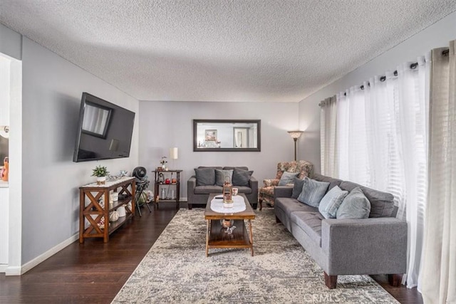 1490 Cabrillo Park Dr Unit B, Santa Ana, CA 92701 - living area featuring dark wood finished floors and a textured ceiling