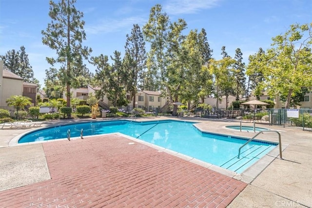 1490 Cabrillo Park Dr Unit B, Santa Ana, CA 92701 - community pool with a patio area and a hot tub