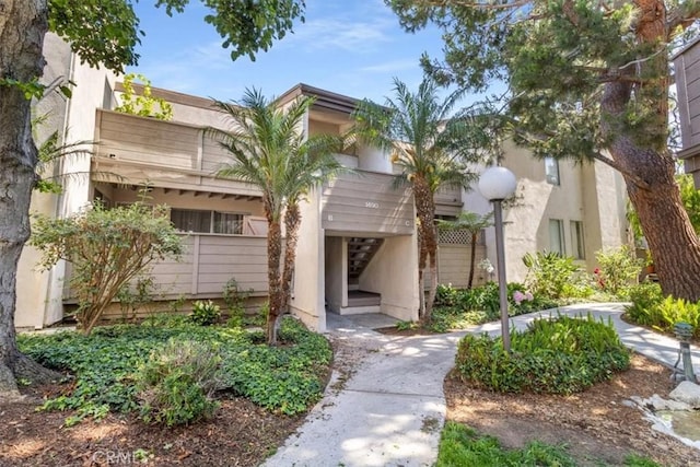 1490 Cabrillo Park Dr Unit B, Santa Ana, CA 92701 - view of building exterior with stairway
