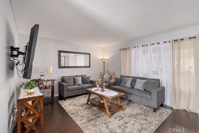 1490 Cabrillo Park Dr Unit B, Santa Ana, CA 92701 - living area featuring a textured ceiling and dark wood finished floors