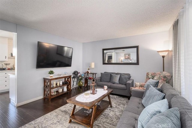 1490 Cabrillo Park Dr Unit B, Santa Ana, CA 92701 - living area with a textured ceiling and dark wood-type flooring
