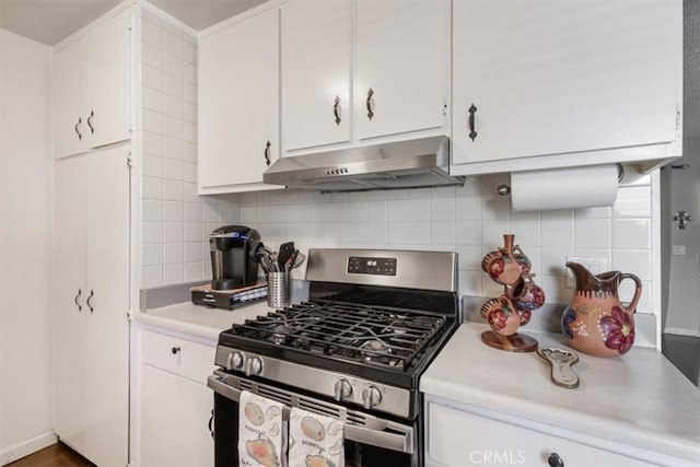 1490 Cabrillo Park Dr Unit B, Santa Ana, CA 92701 - kitchen featuring stainless steel range with gas stovetop, under cabinet range hood, light countertops, and white cabinets