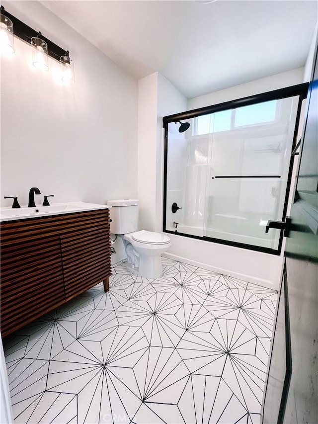 5916 Walnut Ave, Long Beach, CA 90805 - full bath with shower / bath combination with glass door, tile patterned floors, and vanity