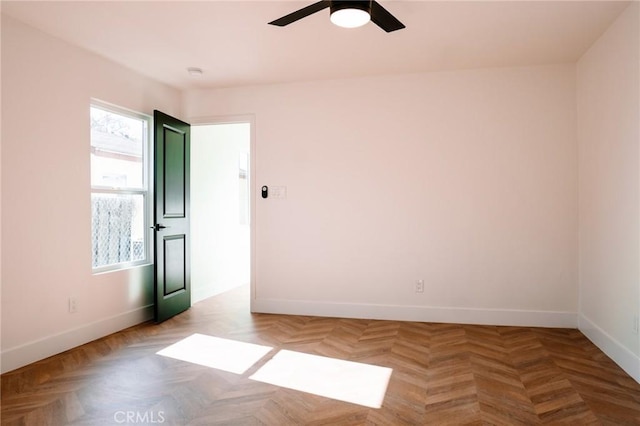 5916 Walnut Ave, Long Beach, CA 90805 - spare room featuring baseboards and a ceiling fan