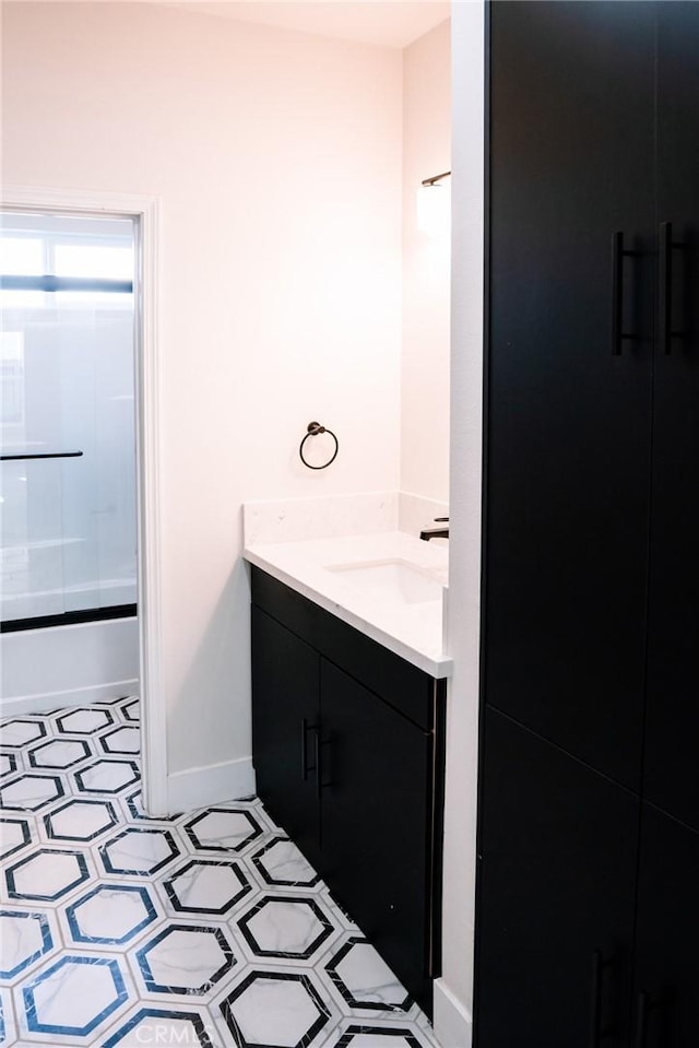 5916 Walnut Ave, Long Beach, CA 90805 - bathroom with vanity, shower / washtub combination, and tile patterned floors