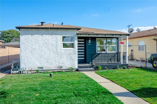 5916 Walnut Ave, Long Beach, CA 90805 - bungalow-style home with stucco siding and covered porch