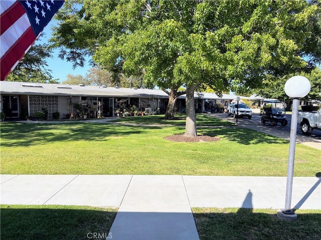 13310 N Fairfield Ln Unit M7 176L, Seal Beach, CA 90740 - view of property's community featuring a yard