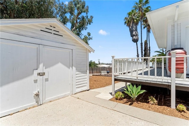976 N Loma Vista Dr, Long Beach, CA 90813 - view of patio featuring a storage unit and a wooden deck