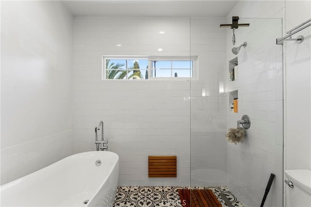 976 N Loma Vista Dr, Long Beach, CA 90813 - full bath featuring a freestanding bath, a tile shower, tile patterned flooring, and tile walls