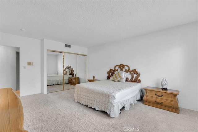 10020 Wystone Ave, Northridge, CA 91324 - bedroom featuring carpet flooring, a closet, and a textured ceiling