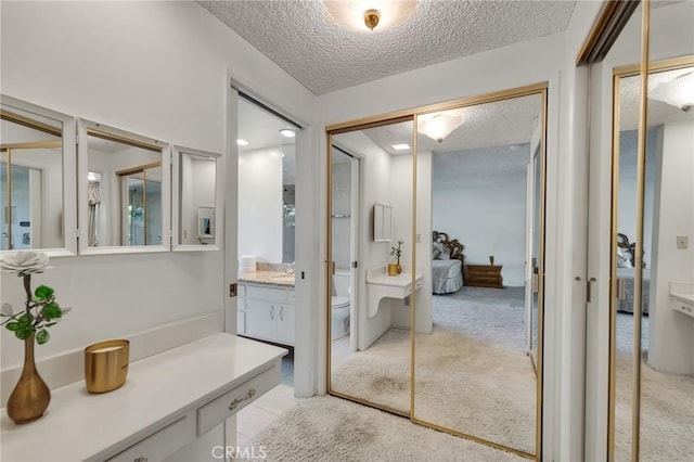 10020 Wystone Ave, Northridge, CA 91324 - full bathroom with a textured ceiling and vanity