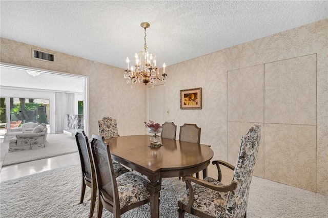10020 Wystone Ave, Northridge, CA 91324 - dining room featuring a chandelier, wallpapered walls, and a textured ceiling