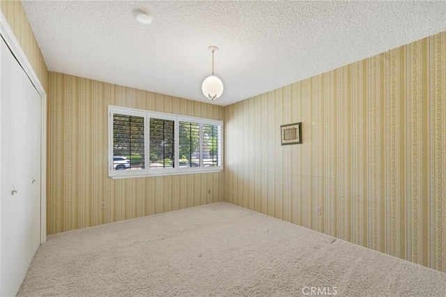 10020 Wystone Ave, Northridge, CA 91324 - carpeted empty room with a textured ceiling