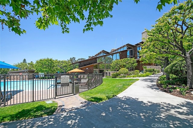 24682 Via Tequila, Lake Forest, CA 92630 - surrounding community with a swimming pool and a gate