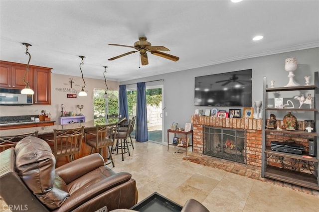 24682 Via Tequila, Lake Forest, CA 92630 - living area featuring a ceiling fan, ornamental molding, a brick fireplace, and recessed lighting