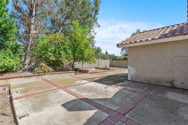24682 Via Tequila, Lake Forest, CA 92630 - fenced backyard featuring a patio area