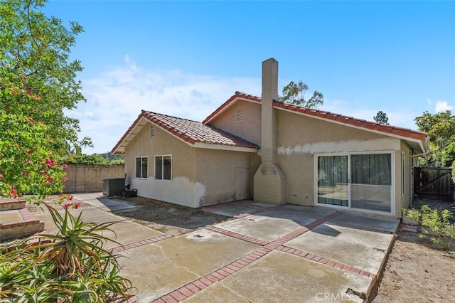24682 Via Tequila, Lake Forest, CA 92630 - rear view of property featuring stucco siding, a fenced backyard, and a patio area