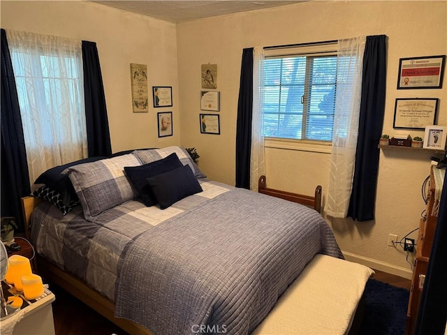 16238 35th Ave, Clearlake, CA 95422 - bedroom with baseboards and a textured wall