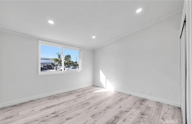 11912 Arthur Dr, Anaheim, CA 92804 - empty room with ornamental molding, recessed lighting, and wood finished floors