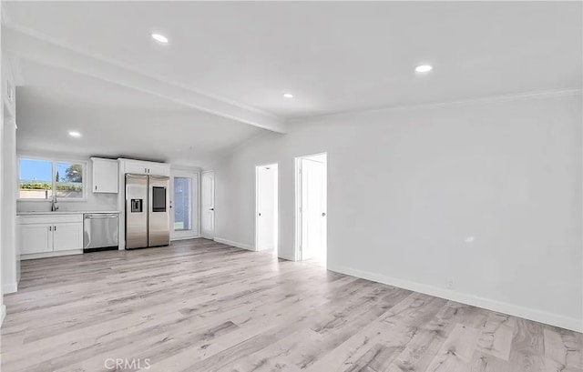 11912 Arthur Dr, Anaheim, CA 92804 - unfurnished living room featuring light wood-style floors and recessed lighting