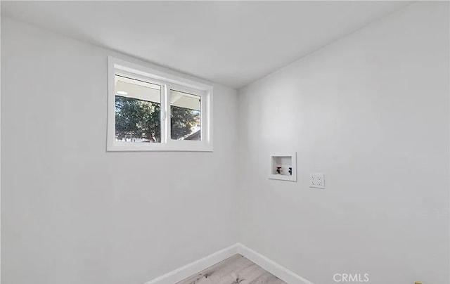 11912 Arthur Dr, Anaheim, CA 92804 - washroom with baseboards and hookup for a washing machine