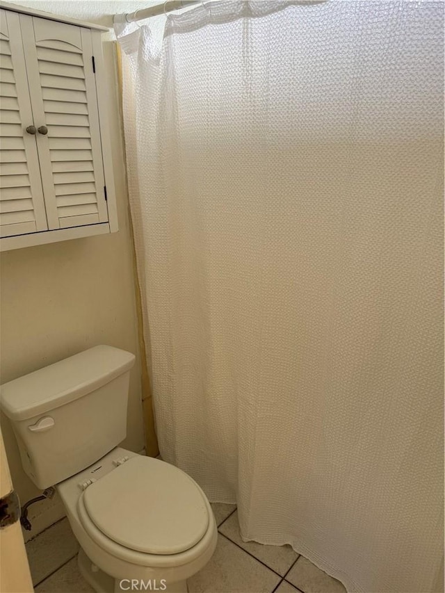 2501 W Redondo Beach Blvd Unit 317, Gardena, CA 90249 - full bathroom with tile patterned floors and curtained shower