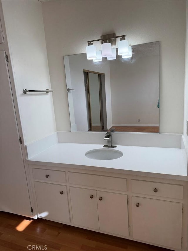 2501 W Redondo Beach Blvd Unit 317, Gardena, CA 90249 - bathroom with vanity and wood finished floors