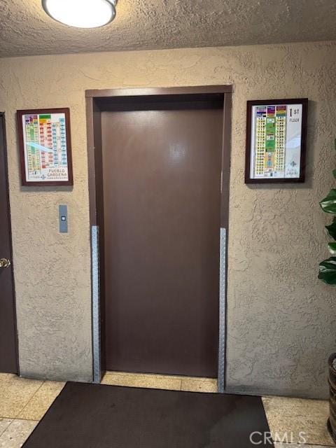 2501 W Redondo Beach Blvd Unit 317, Gardena, CA 90249 - entrance to property featuring elevator